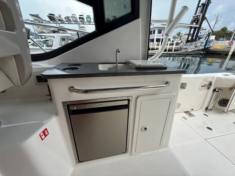 Slide: The Image of Boston Whaler 325 Conquest 2027 - 24