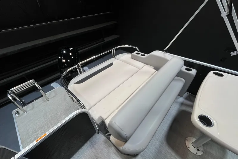 Slide: The Image of 2023 Princecraft Vectra 23 pontoon boat interior with seating and table. - 13