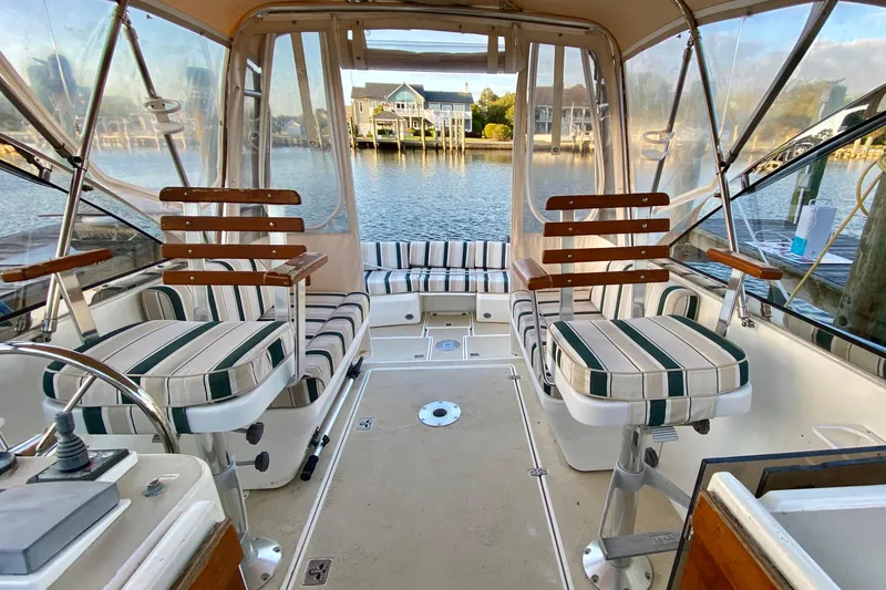 Slide: The Image of Compact yacht bathroom with sink, toilet, and storage in 2003 Legacy Yachts 28 model. - 15