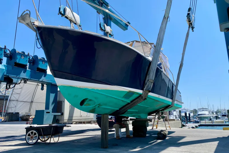 Slide: The Image of 2003 Legacy Yachts 28 sailboat in dry dock for maintenance. - 33