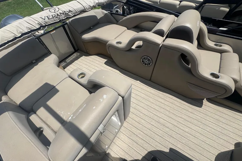 Slide: The Image of Luxurious seating on 2023 Veranda VTX 25RFL pontoon boat with beige upholstery. - 8