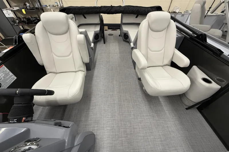 Slide: The Image of Interior of 2025 SunChaser Lucerne 22 LR DH pontoon boat with plush seating. - 12
