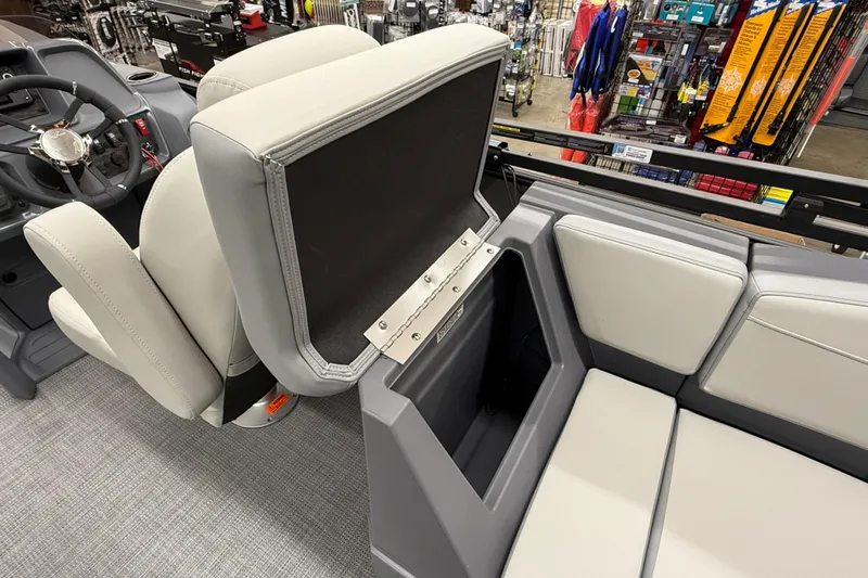 Slide: The Image of Interior of 2025 SunChaser Lucerne 22 LR DH boat with open storage compartment. - 15