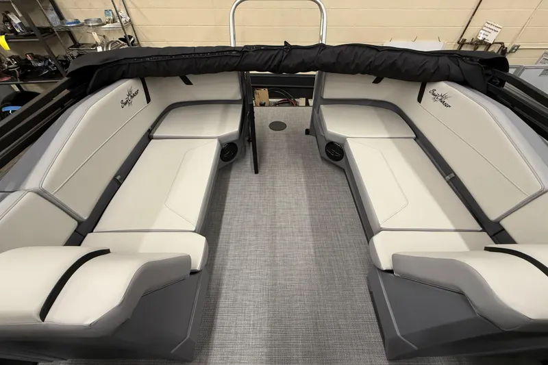 Slide: The Image of 2025 SunChaser Lucerne 22 LR DH boat interior with sleek seating and modern design. - 5