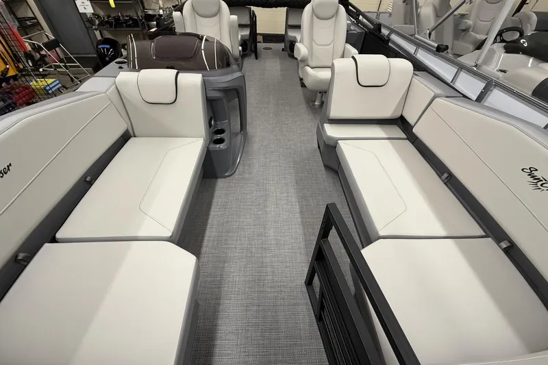 Slide: The Image of Luxurious interior of 2025 SunChaser Lucerne 22 LR DH pontoon boat with plush seating. - 8