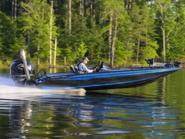 The Image of Skeeter ZXE20 2026 boat speeding on a tranquil lake. - 1