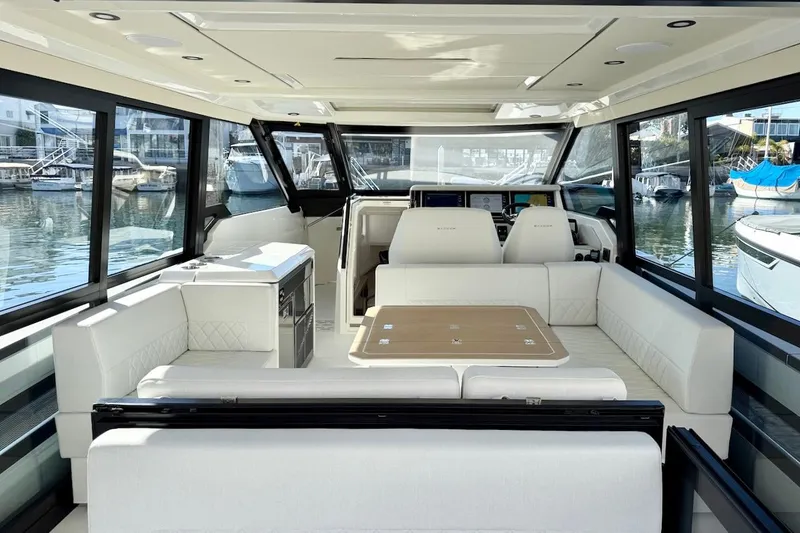 Slide: The Image of 2026 Saxdor 400 GTC yacht interior with luxurious seating and modern design. - 16