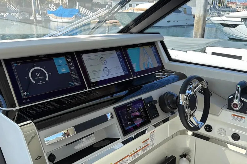 Slide: The Image of Helm of 2026 Saxdor 400 GTC with advanced navigation displays and controls. - 31