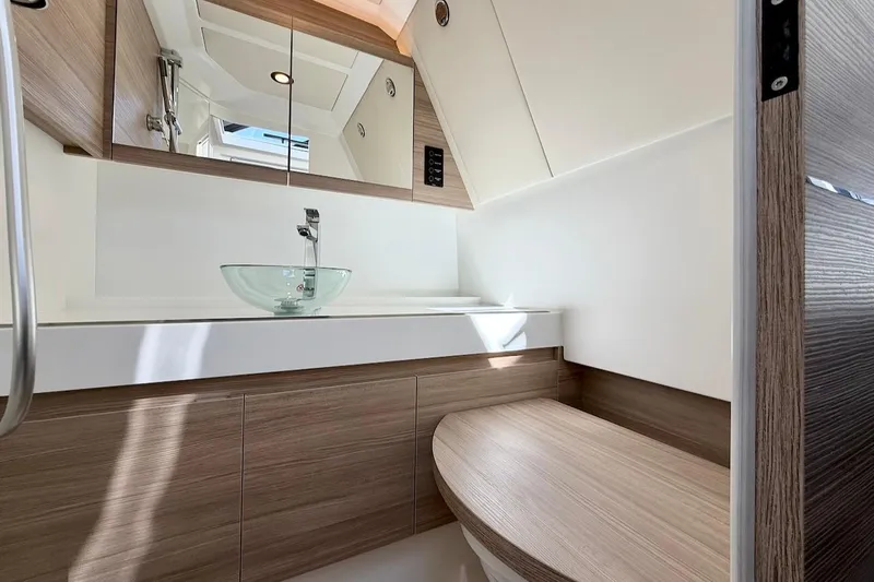 Slide: The Image of Modern bathroom interior in 2026 Saxdor 400 GTC yacht, featuring sleek wood and glass elements. - 39