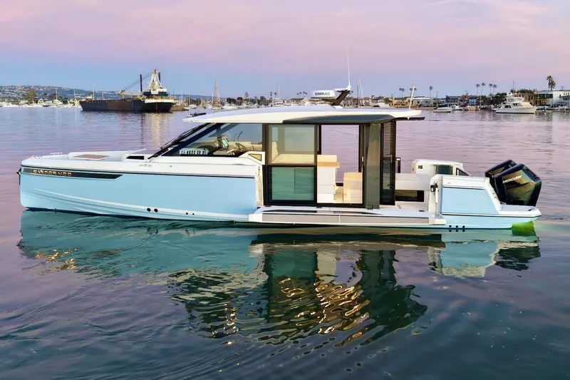 Slide: The Image of 2026 Saxdor 400 GTC luxury boat on calm water at sunset. - 5