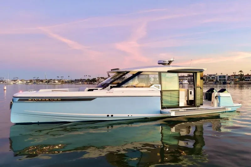 Slide: The Image of 2026 Saxdor 400 GTC luxury yacht on calm water at sunset. - 6