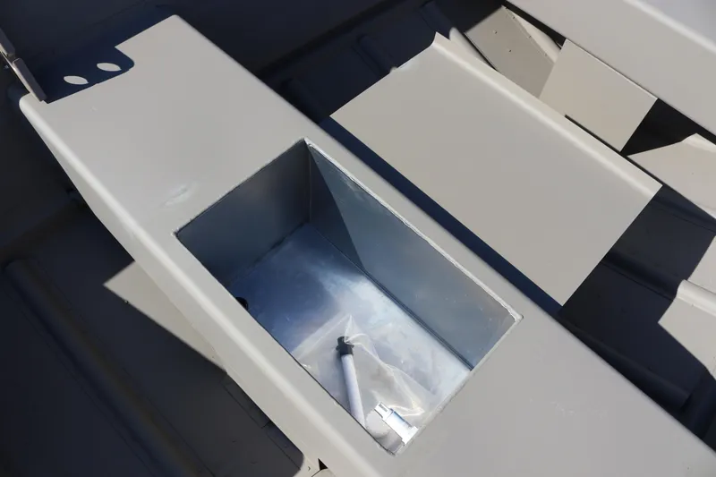 Slide: The Image of 2025 Smoker Craft Voyager 16 interior compartment detail, showcasing storage space. - 9