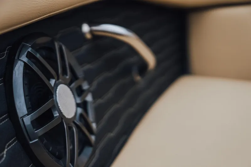 Slide: The Image of Close-up of 2024 Sea Ray SPX 230 interior speaker and handle detail. - 13