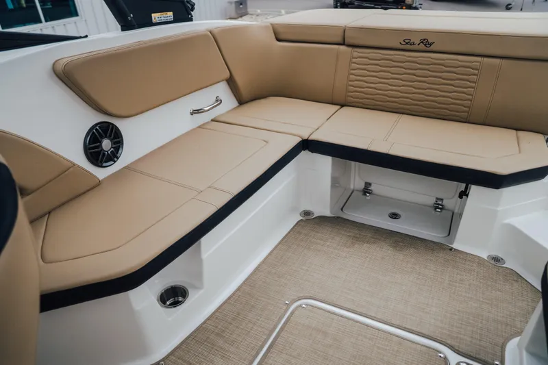 Slide: The Image of Luxurious seating area in 2024 Sea Ray SPX 230 boat with tan upholstery. - 15