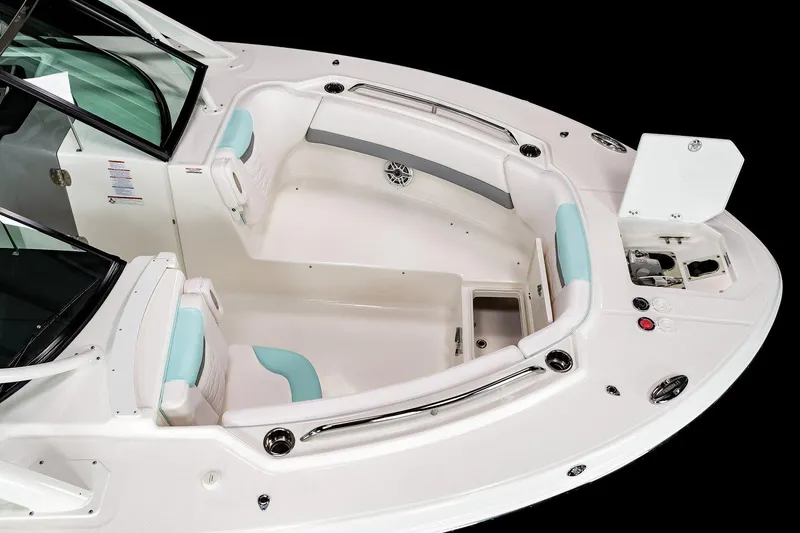 Slide: The Image of Manufacturer Provided Image: 2025 Robalo R317 Dual Console boat interior with seating and storage compartments. - 4