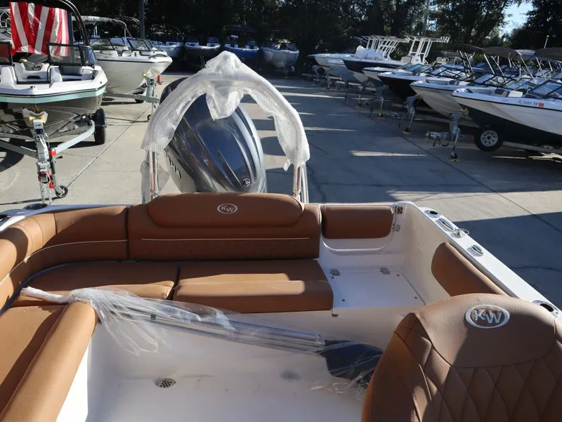Slide: The Image of Key West 203 DFS boat 2026 on a parking lot. - 15