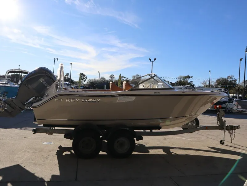 Slide: The Image of Key West 203 DFS boat 2026 on trailer outdoors. - 4