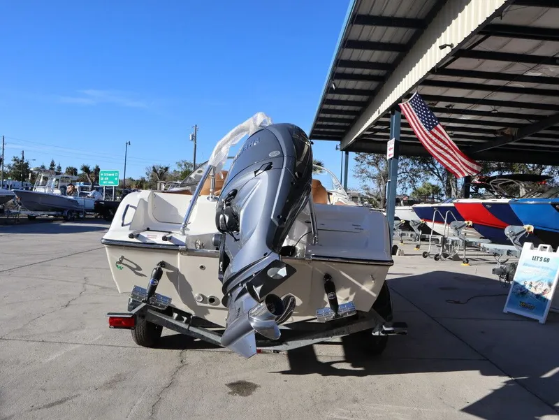 Slide: The Image of Key West 203 DFS boat 2026 on trailer with outboard motor. - 7