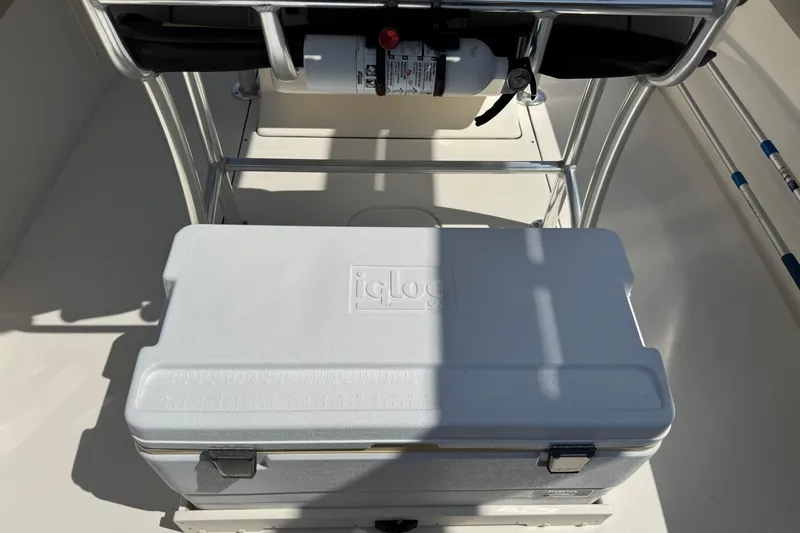 Slide: The Image of 2022 Key West 244 Center Console boat with Igloo cooler and fire extinguisher. - 21