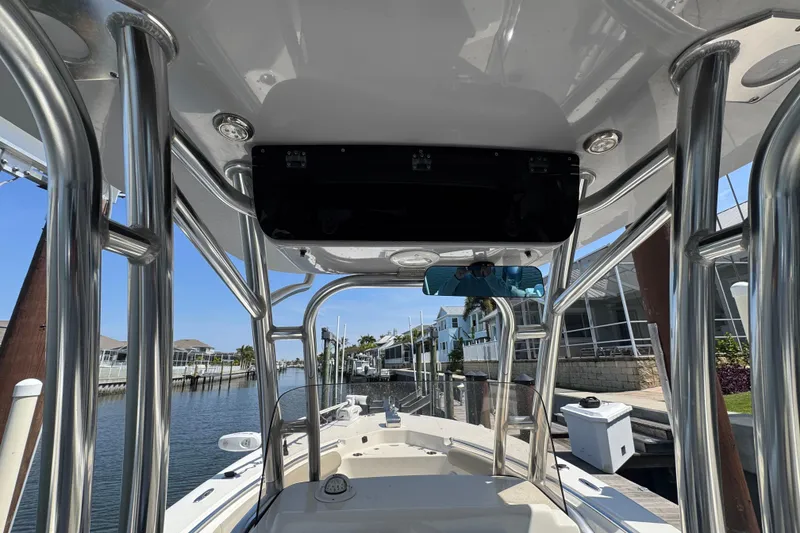 Slide: The Image of 2022 Key West 244 Center Console boat docked, showcasing sleek design and modern features. - 27