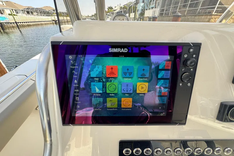 Slide: The Image of Simrad navigation display on 2022 Key West 244 Center Console boat. - 30