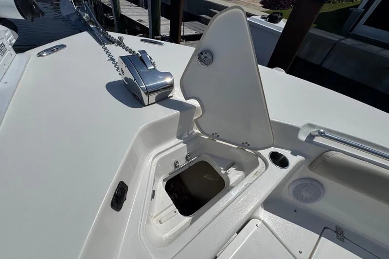 Slide: The Image of 2022 Key West 244 Center Console boat anchor compartment and storage area. - 41