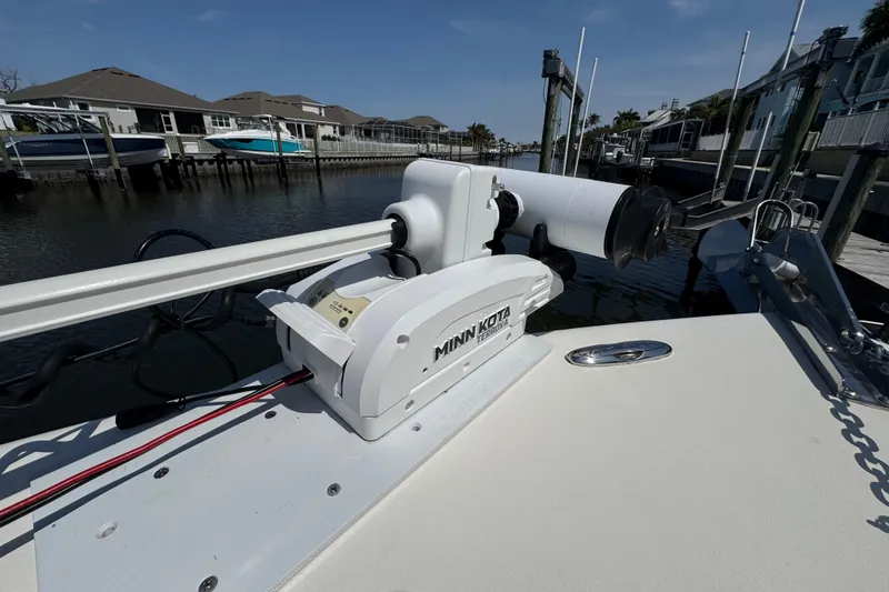Slide: The Image of 2022 Key West 244 Center Console with Minn Kota trolling motor at dockside. - 44