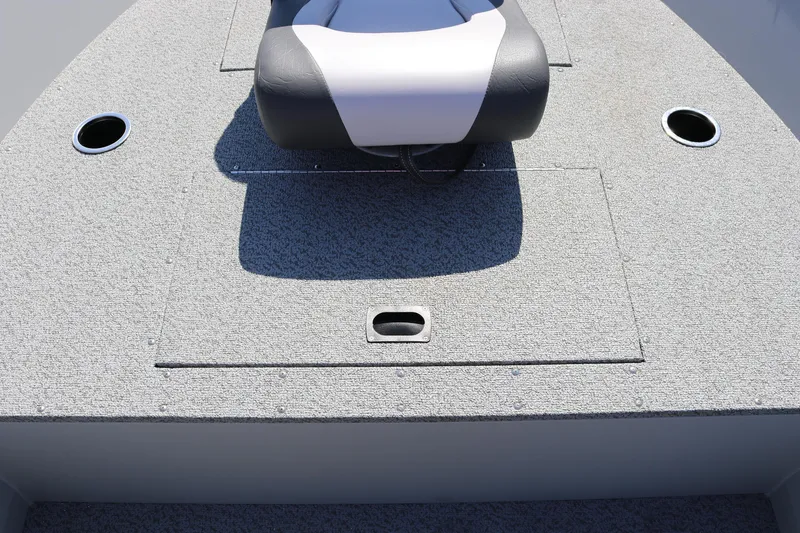 Slide: The Image of 2025 Smoker Craft Angler 16 XL TL boat deck with seating and storage compartments. - 13