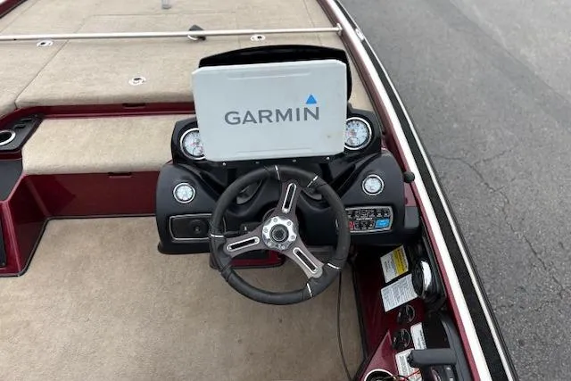 Slide: The Image of Steering console of a 2016 Nitro Z20 boat with Garmin navigation system. - 24