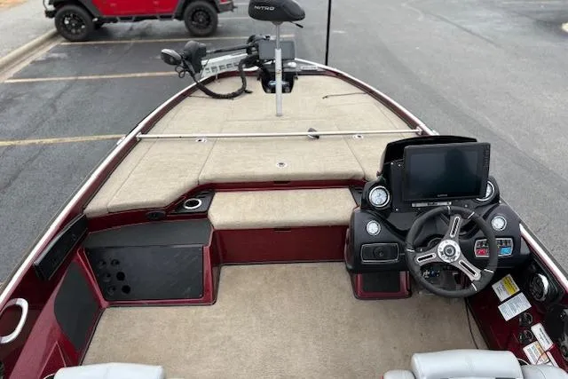 Slide: The Image of 2016 Nitro Z20 boat interior with steering console and navigation equipment. - 40