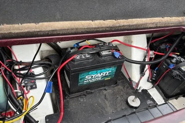 Slide: The Image of Marine battery setup in a 2016 Nitro Z20 boat compartment. - 53