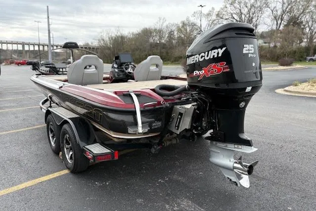 Slide: The Image of 2016 Nitro Z20 boat with Mercury Pro XS 25 engine in parking lot. - 6