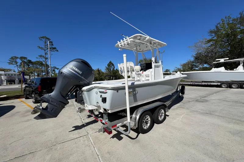 Slide: The Image of 2023 Sea Hunt BX 22 BR boat on trailer with Yamaha outboard motor. - 12