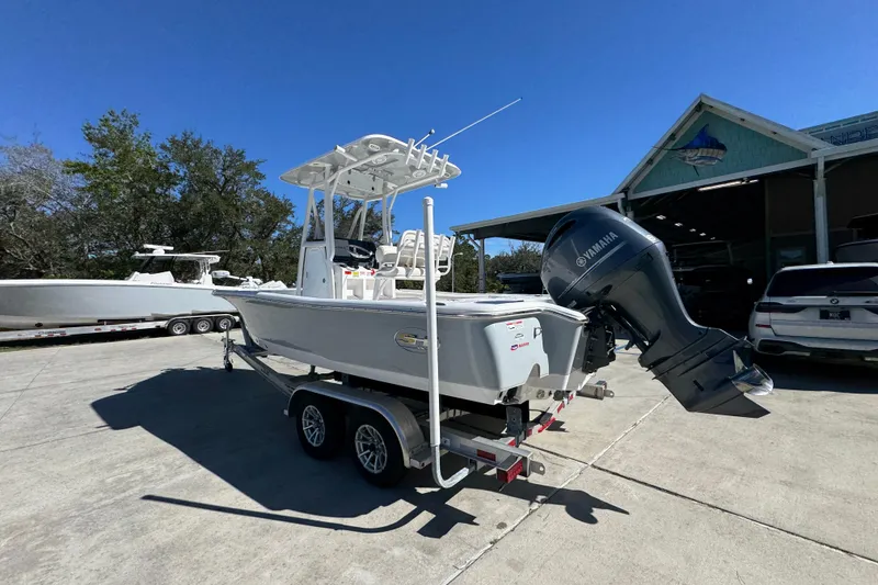 Slide: The Image of 2023 Sea Hunt BX 22 BR boat on trailer with Yamaha outboard motor. - 16