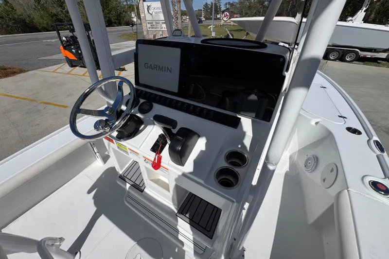 Slide: The Image of 2023 Sea Hunt BX 22 BR boat console with Garmin navigation system and steering wheel. - 34