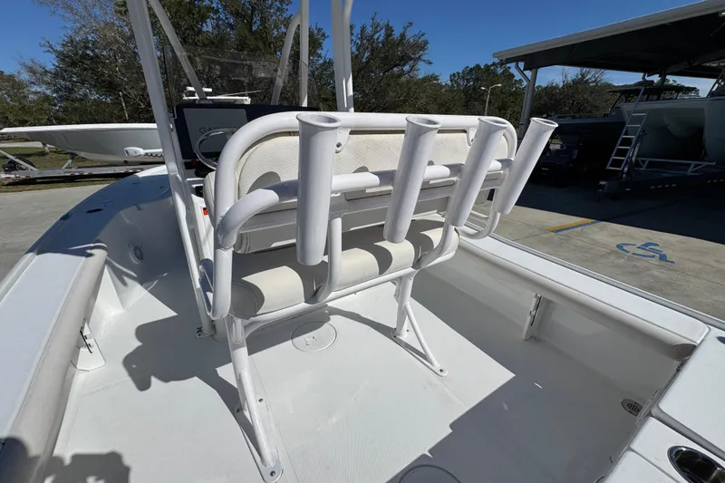 Slide: The Image of 2023 Sea Hunt BX 22 BR boat interior with rod holders and seating. - 35