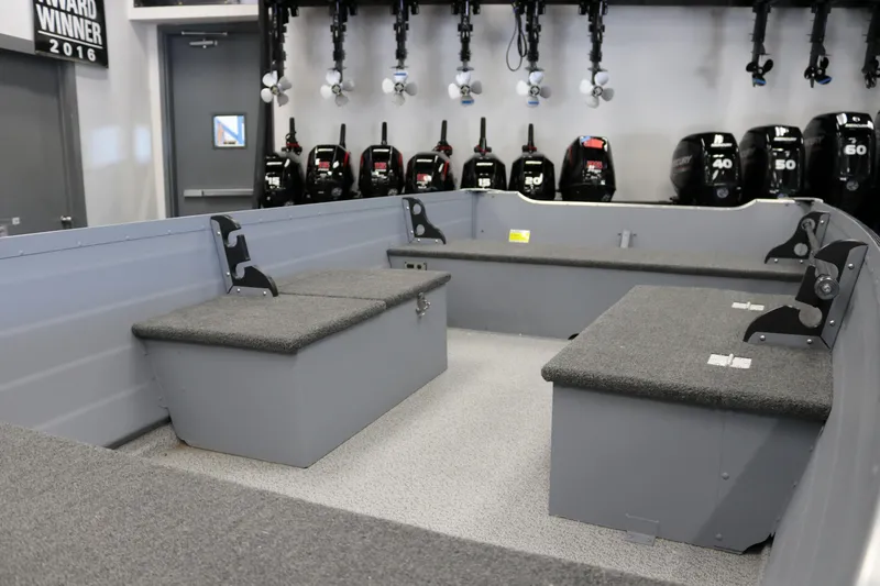 Slide: The Image of 2025 Smoker Craft Big Fisherman 14 boat interior with seating and storage compartments. - 8