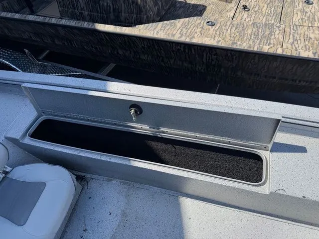 Slide: The Image of 2019 Xpress XP 200 Catfish boat with open storage compartment. - 10