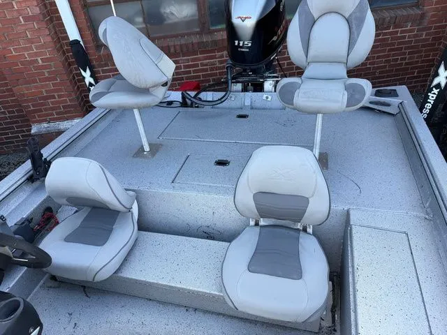 Slide: The Image of 2019 Xpress XP 200 Catfish boat with gray seats and motor. - 9