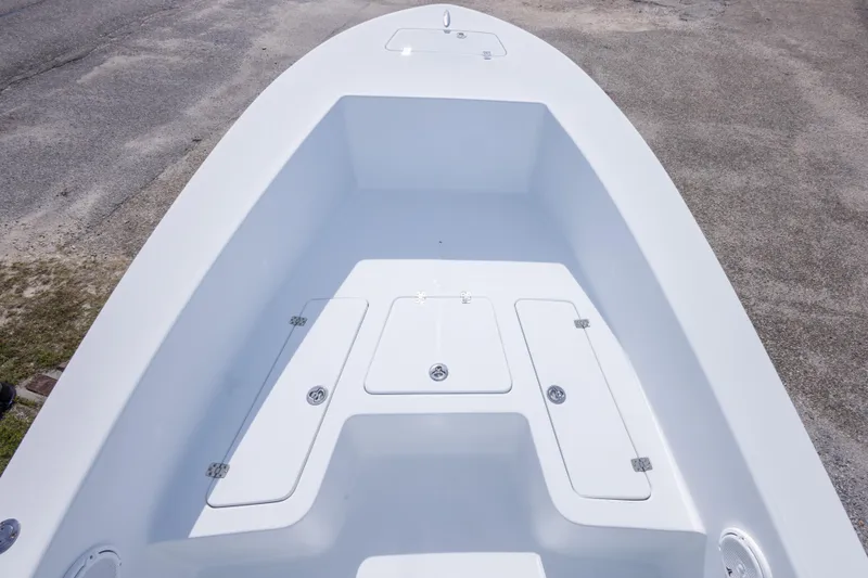 Slide: The Image of 2007 Andros Cuda 23 boat deck with storage compartments, viewed from above. - 30