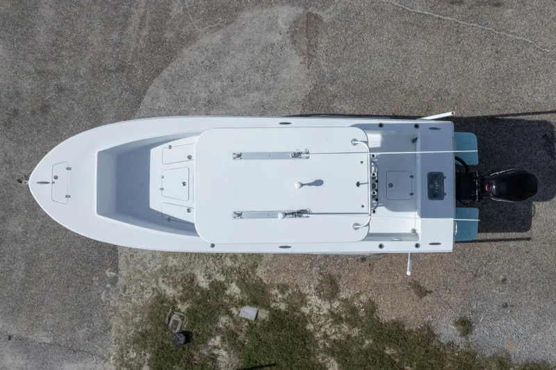 Slide: The Image of Aerial view of 2007 Andros Cuda 23 boat on a gravel surface. - 4