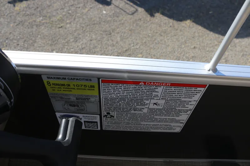 Slide: The Image of Safety and capacity labels on 2025 SunChaser Vista 18 Fish boat, maximum 8 persons or 1075 lbs. - 14