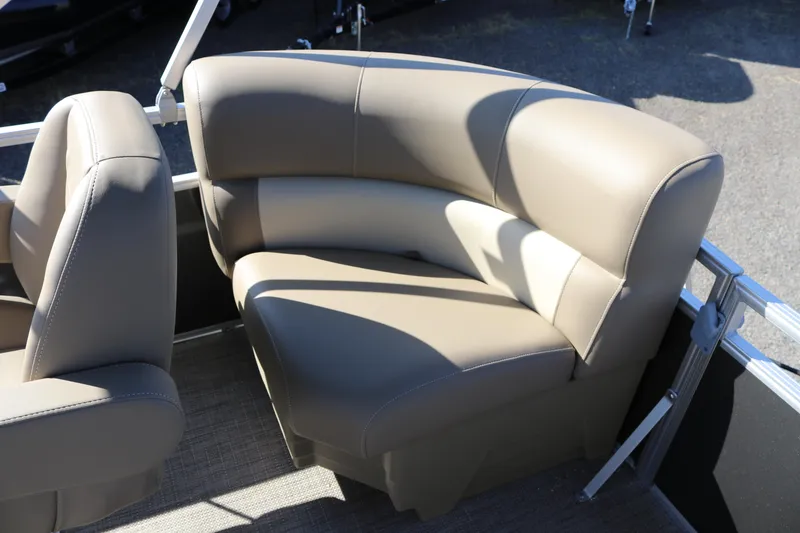 Slide: The Image of Luxurious seating on 2025 SunChaser Vista 18 Fish pontoon boat, featuring beige upholstery. - 15