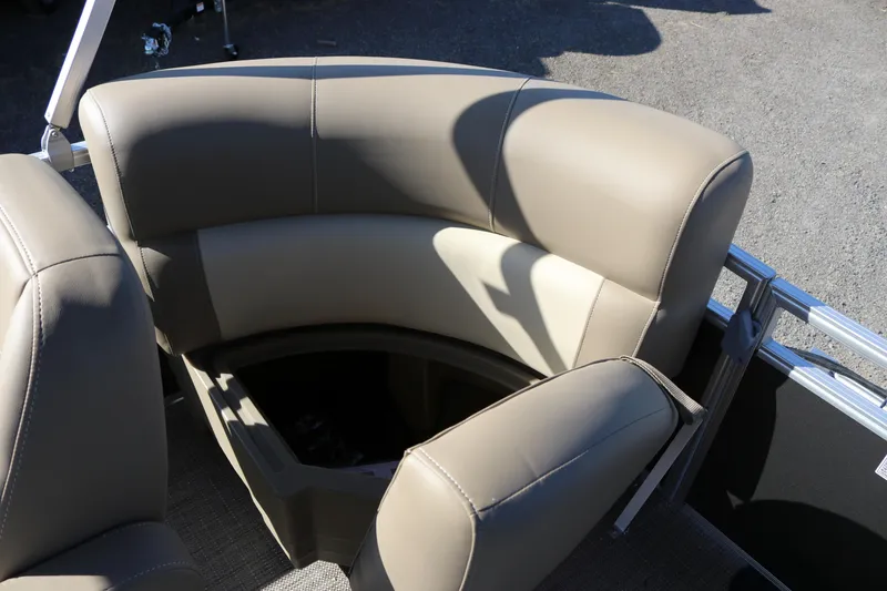 Slide: The Image of 2025 SunChaser Vista 18 Fish boat seating with beige upholstery and storage compartment. - 16