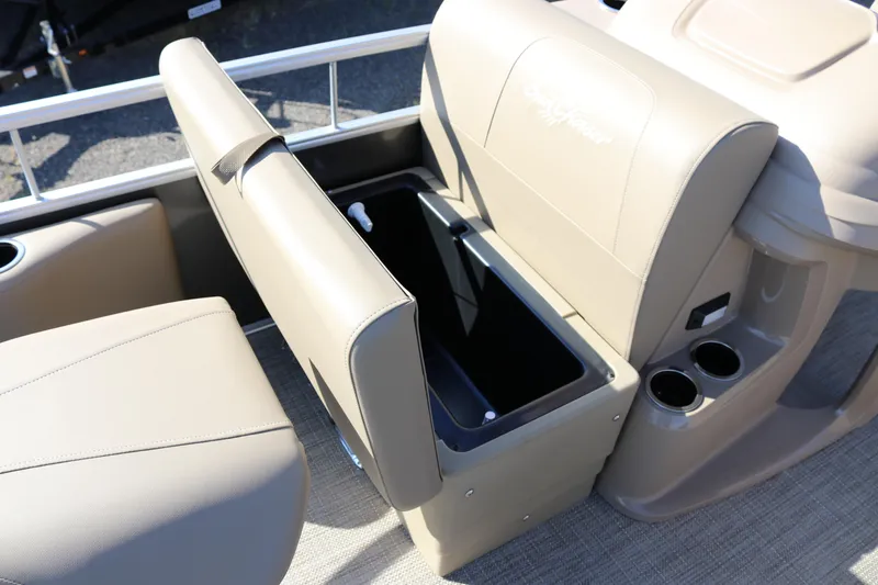 Slide: The Image of SunChaser Vista 18 Fish 2025 boat seat with storage compartment and cup holders. - 8