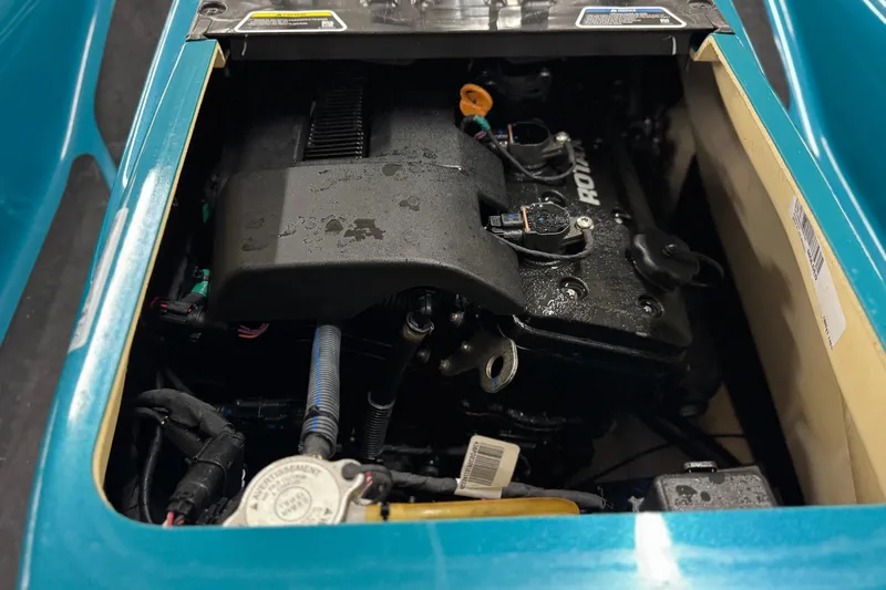 Slide: The Image of Engine compartment of 2018 Sea-Doo Wake Pro 230, showcasing Rotax engine components. - 12