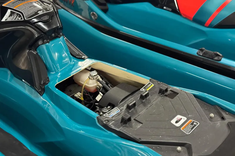 Slide: The Image of 2018 Sea-Doo Wake Pro 230 engine compartment, showcasing internal components and design. - 23