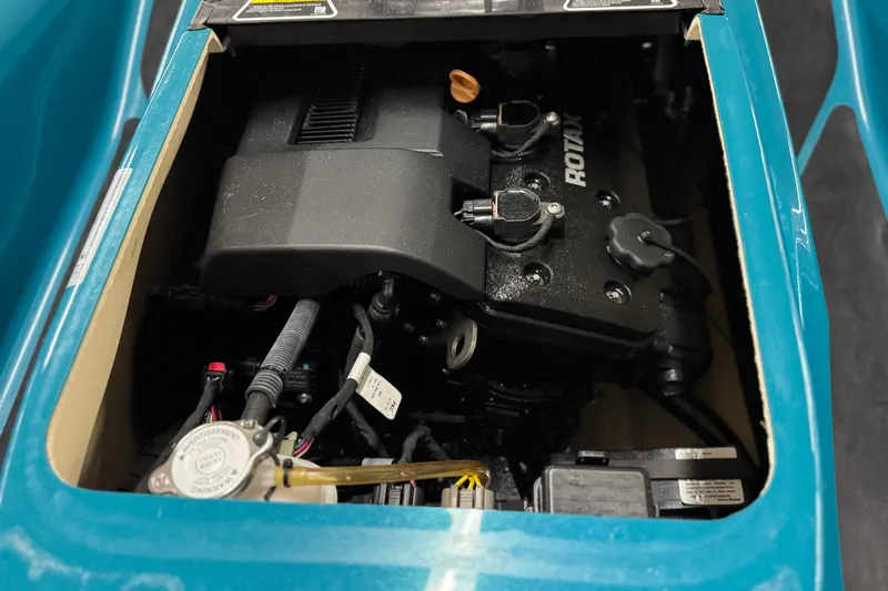 Slide: The Image of 2018 Sea-Doo Wake Pro 230 engine compartment with visible Rotax engine components. - 24