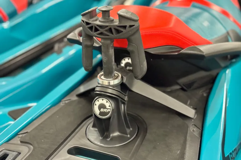 Slide: The Image of 2018 Sea-Doo Wake Pro 230, close-up of BRP accessory mount on red and teal seat. - 8