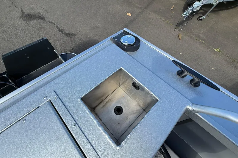 Slide: The Image of 2025 Alumaweld Stryker X202 boat deck with built-in sink and cleat. - 14